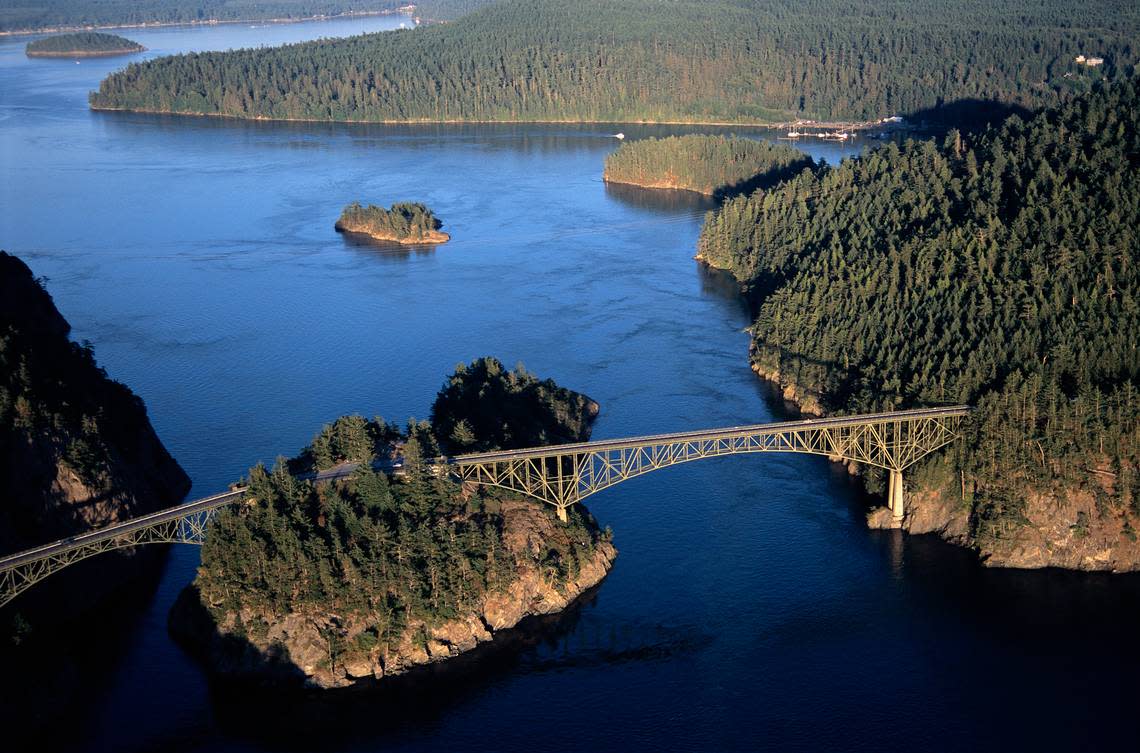 Deception Pass bridge connects Whidbey and Fidalgo Islands in Puget Sound. Deception Pass State Park turns 100 in 2022. Washington State Parks turned an old military reserve, long the traditional land of the Samish and Swinomish tribes, into a popular state park.