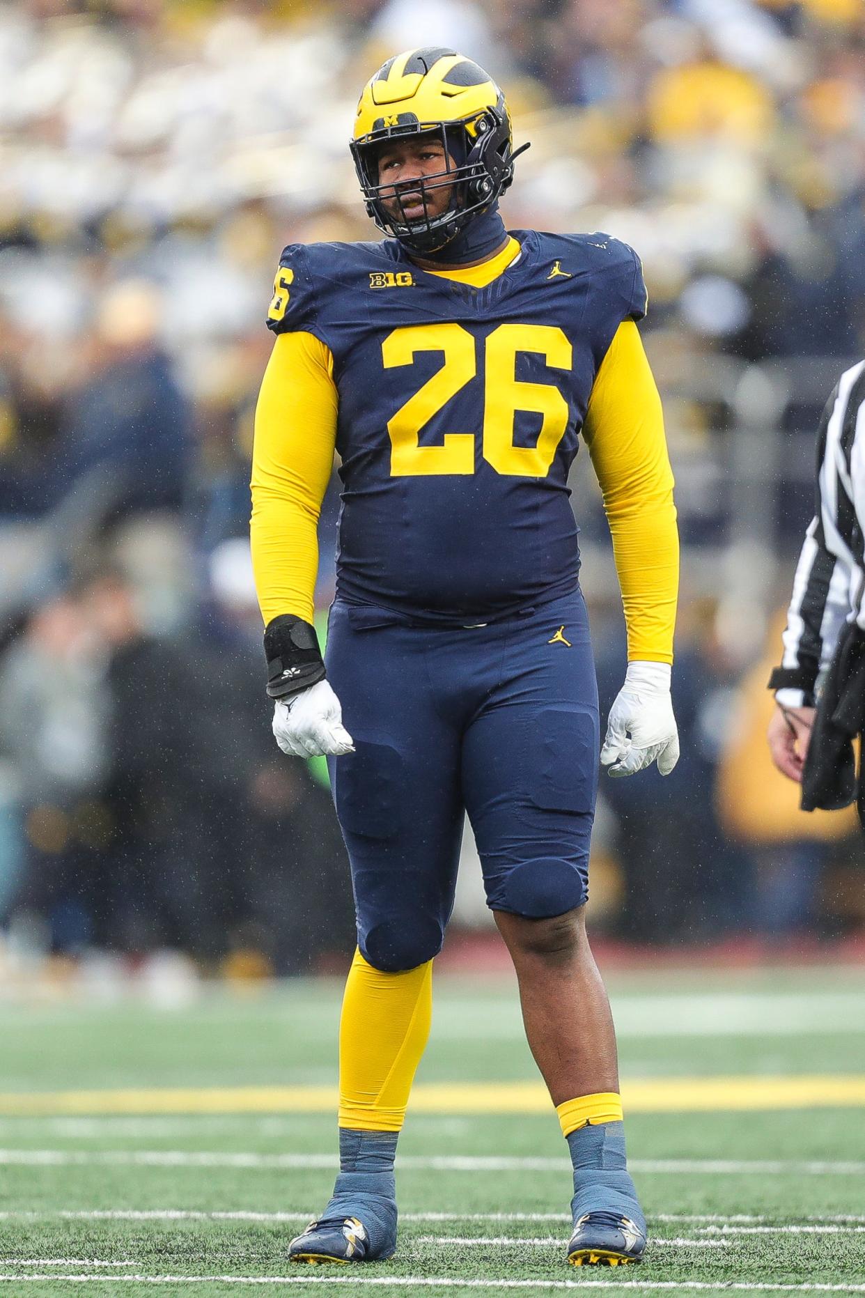 Michigan defensive lineman Rayshaun Benny gets in position before a play against Indiana during the second half of U-M's 52-7 win over Indiana on Saturday, Oct. 14, 2023, in Ann Arbor.