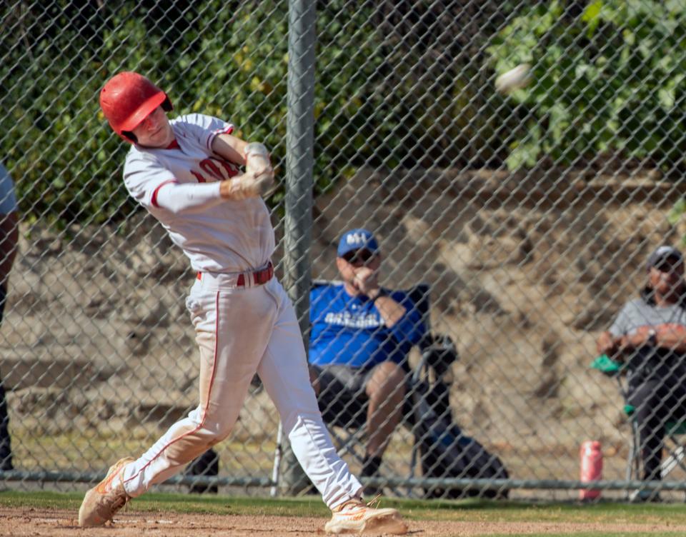 Lodi's Austin Meehleis hits a double during a varsity baseball game against Mountain House at Tony Zupo Field in Lodi on Tuesday, May, 9, 2023. Lodi won 6-4.