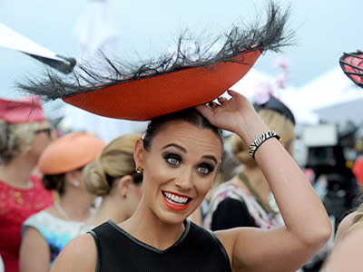 There are always some wild hats on Melbourne Cup day but this year it seemed the bigger the better. If it rained she'd be fine for a while but it would end in disaster.