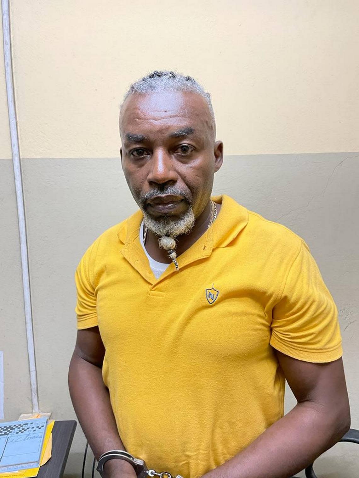 Haiti National Police Inspector Wakin Pierre, 49, who was assigned to the presidential palace security detail, was arrested by his fellow officers for transporting thousands of cartridges of ammunition.