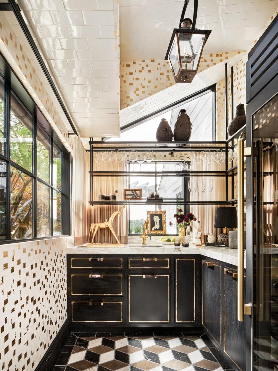 a kitchen with a chandelier and a large window