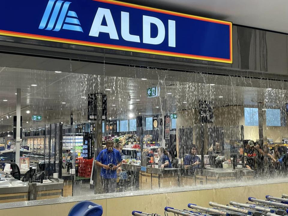 One Aldi supermarket in western Sydney couldn't keep out the rain on Monday. Source: Facebook/Kate Lenertz  