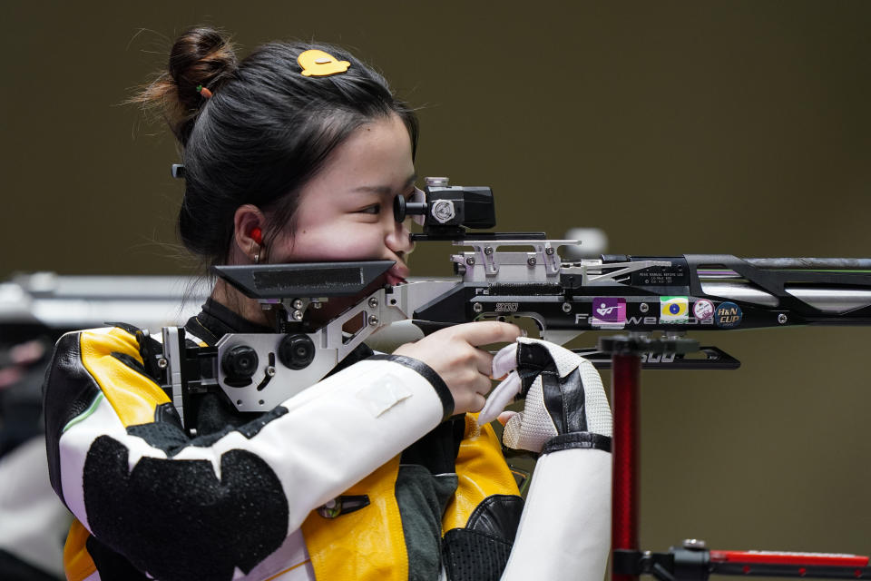 Yang Qian, of China, competes in the women's 10-meter air rifle at the Asaka Shooting Range in the 2020 Summer Olympics, Saturday, July 24, 2021, in Tokyo, Japan. (AP Photo/Alex Brandon)