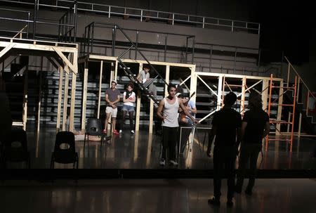 Actors take part in a rehearsal for the musical "Rent" in a theatre in Havana November 25, 2014. REUTERS/Enrique De La Osa