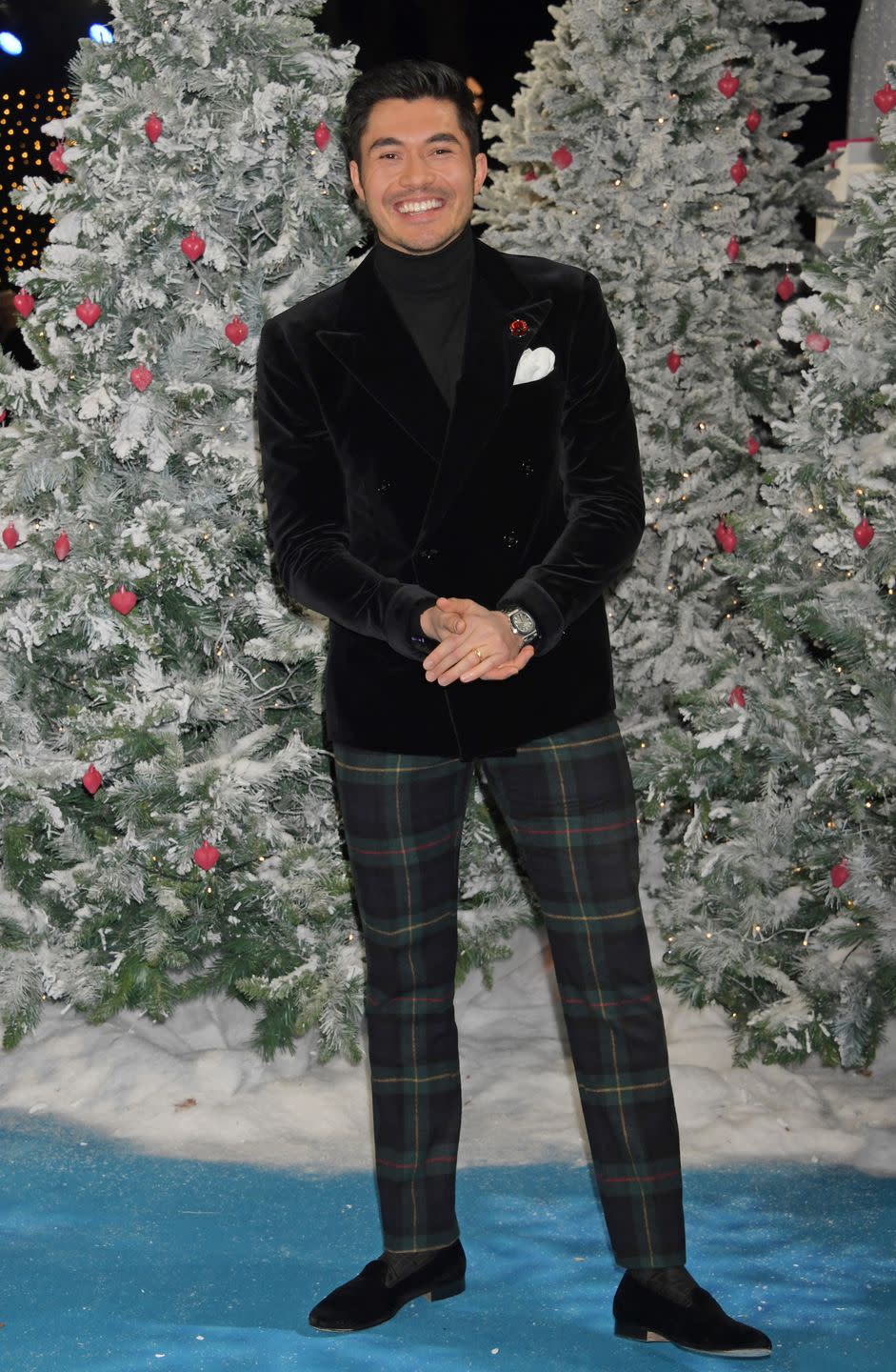 <p>Henry Golding in tartan. Or, how to dress for a guest appearance on a Bing Crosby Christmas special. </p>