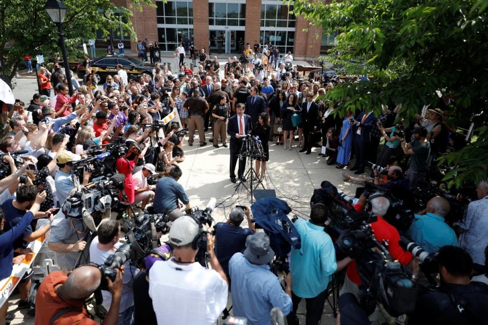 Johnny Depp’s attorneys speaking to his supporters outside the courthouse on 1 June after the verdict was announced (REUTERS)