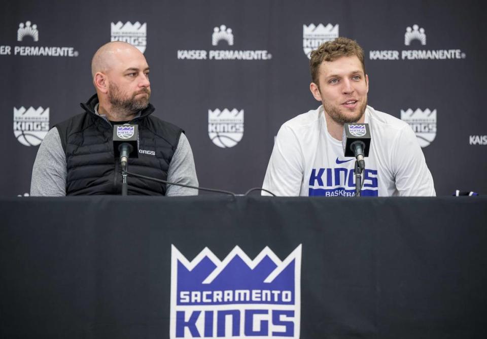 Sasha Vezenkov, right, and general manager Monte McNair answer questions as Vezenkov is introduced as a new Sacramento Kings NBA player during a press conference Thursday, Aug. 31, 2023, at Golden 1 Center.
