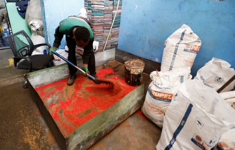 Kenyan entrepreneur recycles plastic waste into building blocks in Nairobi