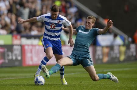 Britain Football Soccer - Reading v Wigan Athletic - Sky Bet Championship - The Madejski Stadium - 29/4/17 Reading's George Evans in action with Wigan Athletic's Dan Burn Mandatory Credit: Action Images / Adam Holt Livepic