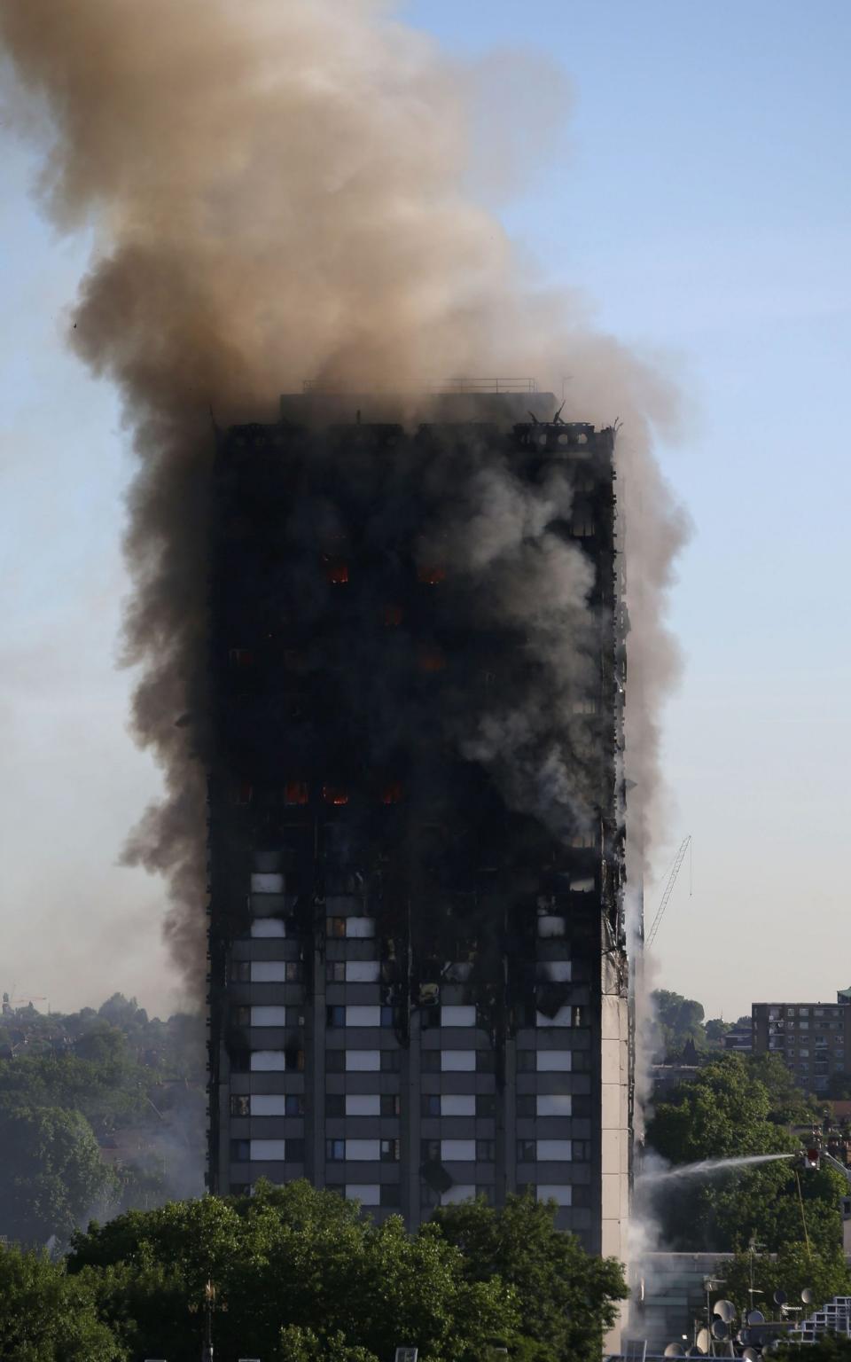At least 79 people died in the Grenfell Tower fire which was started by a faulty Hotpoint fridge-freezer - Credit: AFP