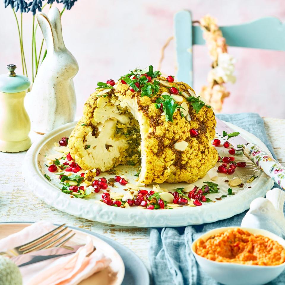 <p>This whole roasted cauliflower is a total showstopper. Spicy hummus nestled in between the florets guarantees layers of flavour in every mouthful.</p><p><strong>Recipe: <a href="https://www.goodhousekeeping.com/uk/food/recipes/a39427581/spiced-whole-roasted-cauliflower/" rel="nofollow noopener" target="_blank" data-ylk="slk:Spiced whole-roasted cauliflower;elm:context_link;itc:0;sec:content-canvas" class="link ">Spiced whole-roasted cauliflower</a></strong></p>