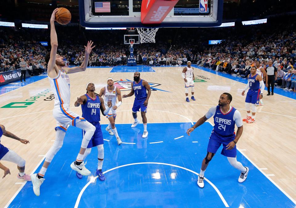 Thunder forward Chet Holmgren (7) goes up for a dunk during a 134-115 win against the Clippers on Thursday night at Paycom Center.