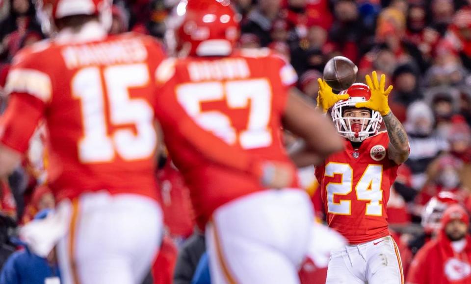 Chiefs wide receiver Skyy Moore catches a pass from Patrick Mahomes during the AFC Championship Game Sunday night at GEHA Field at Arrowhead Stadium.