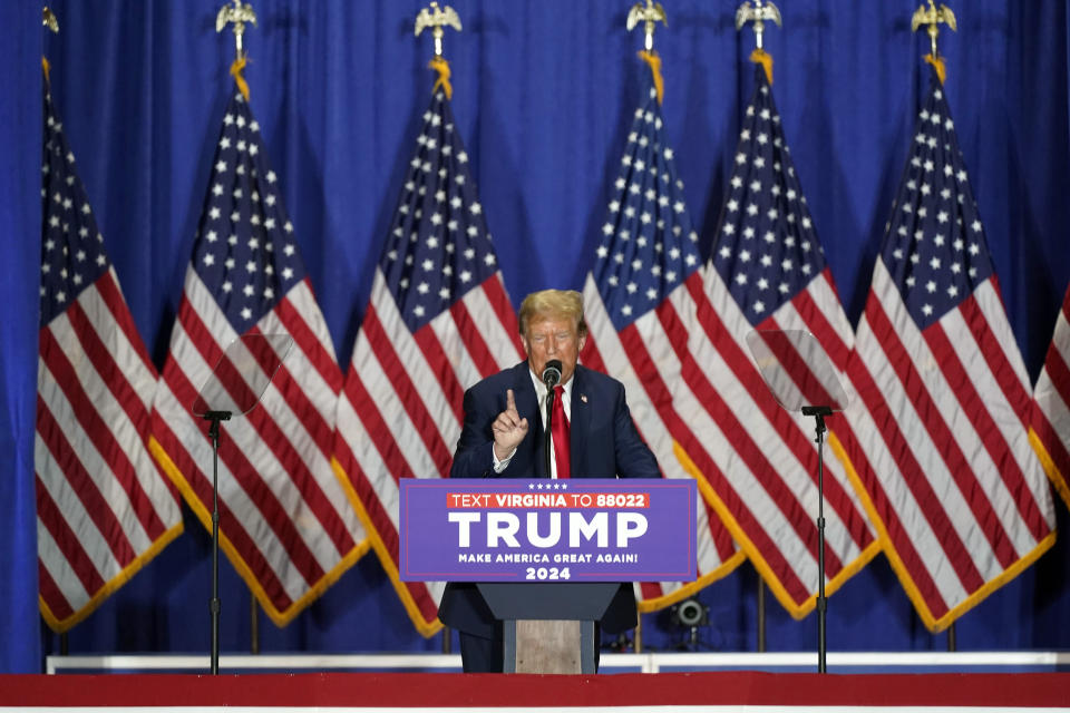 FILE - Republican presidential candidate former President Donald Trump speaks at a campaign rally, March 2, 2024, in Richmond, Va. A lawsuit settlement offers new details about how two attorneys for former President Donald Trump orchestrated a plan for fake electors to file paperwork falsely saying the Republican won Wisconsin in a strategy to overturn Democrat Joe Biden’s 2020 victory there and in other swing states. The agreement settles a civil lawsuit filed by Democrats against the attorneys and the fake electors. (AP Photo/Steve Helber, File)