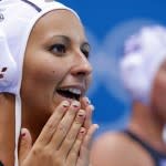 Hungary's Dora Csabai reacts during their women's preliminary round Group A water polo match against China at the London 2012 Olympic Games at the Water Polo Arena