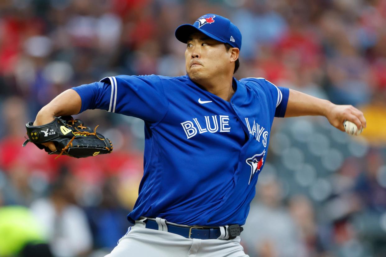 Toronto Blue Jays starting pitcher Hyun Jin Ryu delivers against the Cleveland Guardians during the first inning of a baseball game, Monday, Aug. 7, 2023, in Cleveland. (AP Photo/Ron Schwane)