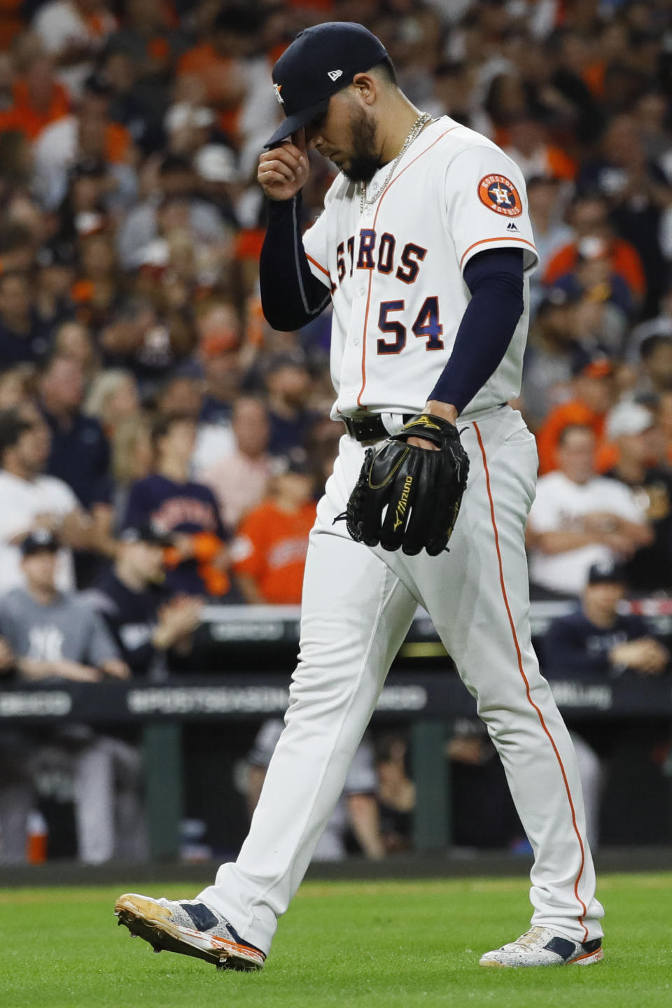 Houston Astros relief pitcher Roberto Osuna reacts after giving up a two-run home run to New York Yankees' DJ LeMahieu during the ninth inning in Game 6 of baseball's American League Championship Series Saturday, Oct. 19, 2019, in Houston. (AP Photo/Matt Slocum)