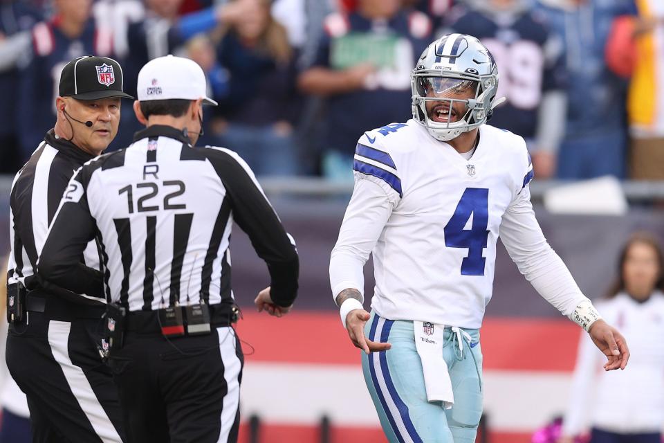 Dak Prescott of the Dallas Cowboys reacts after a call in the first quarter against the New England Patriots at Gillette Stadium on October 17, 2021 in Foxborough, Massachusetts.