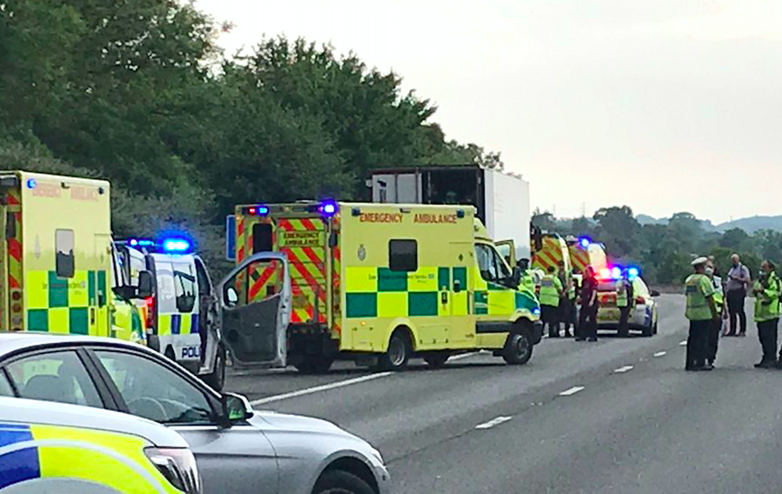 Police on the M11 motorway after sixteen people were arrested for immigration offences. (Andy Brookes/Twitter/PA)