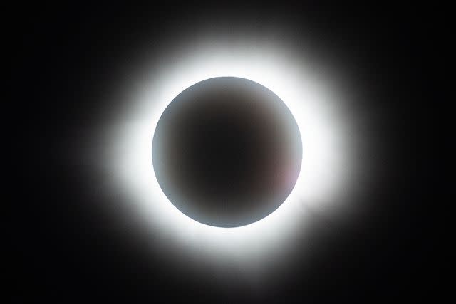 <p>Hector Vivas/Getty</p> Total solar eclipse in Mexico on April 8