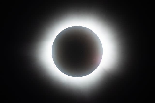 <p>Hector Vivas/Getty</p> The sun disappears behind the moon on April 08, 2024 in Mazatlán, Mexico.