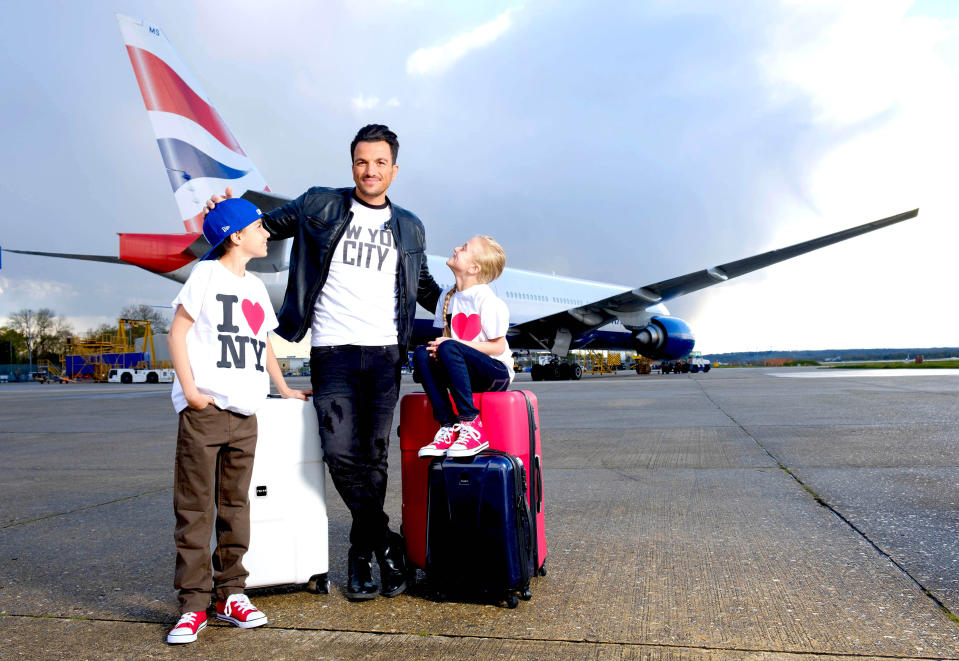 EDITORIAL USE ONLY Peter Andre and his children Junior and Princess on the tarmac at Gatwick Airport in front of a British Airways 777 to celebrate the launch of the airline&Otilde;s new route from Gatwick Airport to New York, JFK, which starts today.