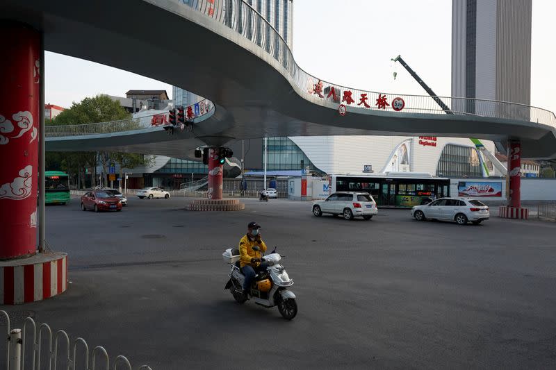 The Wider Image: Before and After: life is slowly reemerging in Wuhan