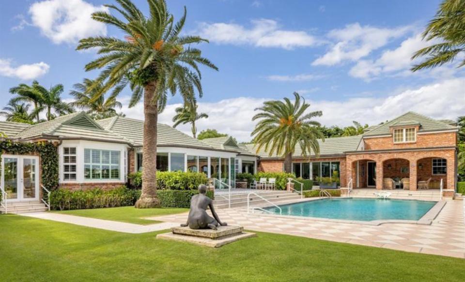 Remodeled and expanded by sellers Bob Vila and Diana Barrett, a house listed for $52.9 million has a lakefront swimming pool at 690 Island Drive in Palm Beach.