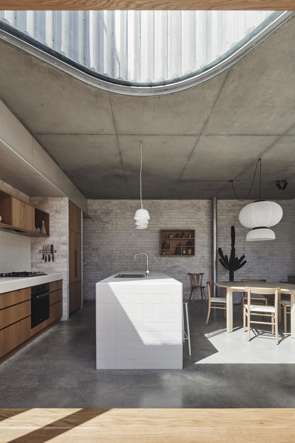 Tiled kitchen island by Andrew Burges Architects