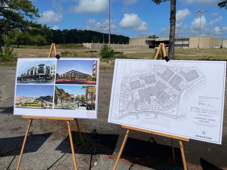 With Regency Mall's empty Montgomery Ward in the background, artist's renderings show plans and concepts for a mixed-use residential and commercial development for the derelict site.