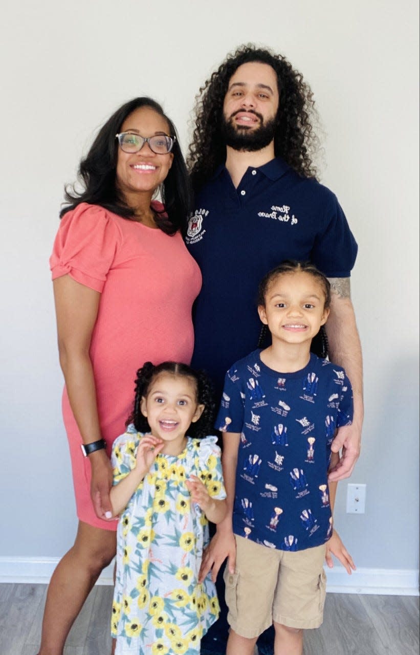Medical College of Georgia student Shantelle Griffith with her husband, three-year-old daughter, Reina, and seven-year-old son, Karter, in April 2021.