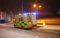 <p>An ambulance drives through the snow in Tunbridge Wells, Kent, following heavy overnight snowfall. (PA) </p>