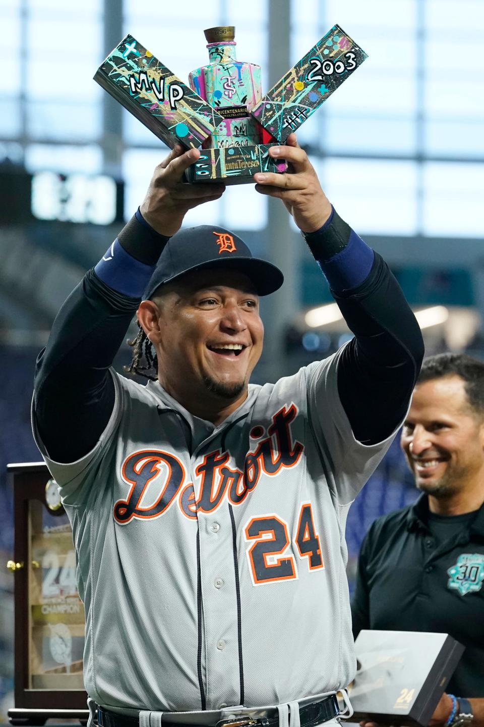 Detroit Tigers' Miguel Cabrera raises a special edition Santa Teresa Rum, a gift from the Miami Marlins, during a pre-game ceremony at loanDepot Park in Miami on Friday, July 28, 2023.