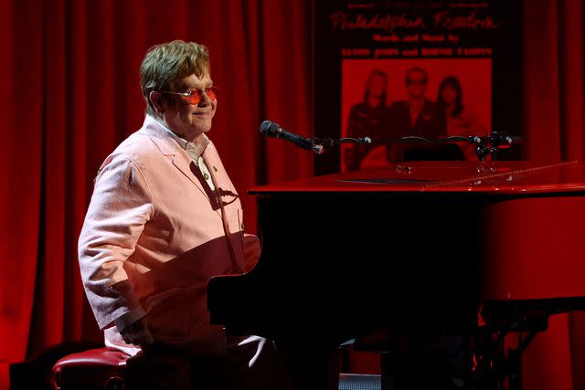 <p>Kevin Mazur/Getty</p> Elton John performing onstage during the Library Of Congress 2024 Gershwin Prize for Popular Song
