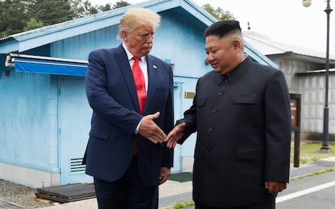 Donald Trump meeting Kim Jong-un in June 2019 - Credit: Susan Walsh/AP