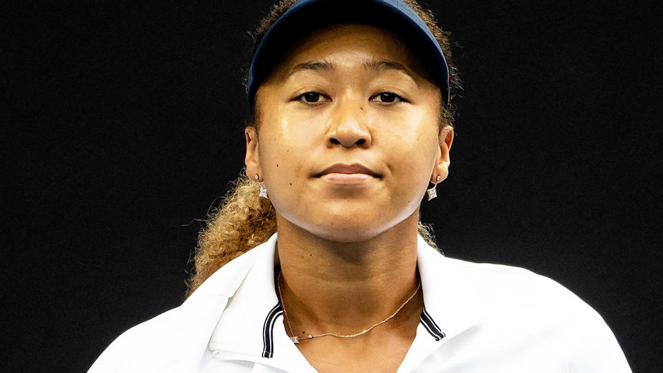 Naomi Osaka says she placed too much pressure on herself in a difficult 2021 season. (Photo by MIKE FREY/AFP via Getty Images)