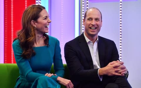 The Duke and Duchess of Cambridge spend time with young people to discuss cyberbullying - Credit: AFP