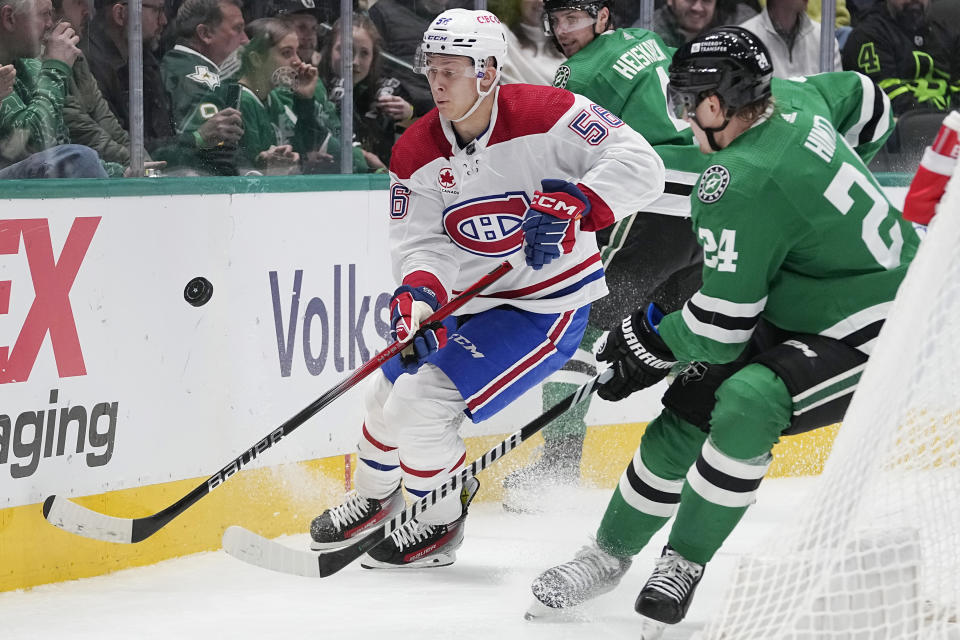 Montreal Canadiens right wing Jesse Ylonen (56) skates for the puck against Dallas Stars center Roope Hintz (24) during the second period an NHL hockey game in Dallas, Tuesday, Jan. 2, 2024. (AP Photo/LM Otero)