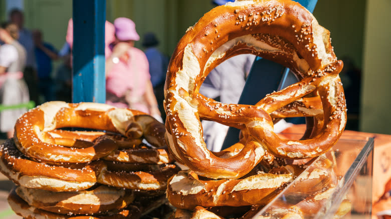 Bavarian pretzels stacked at a vendor stand