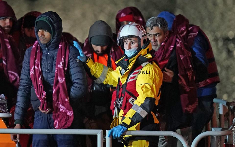 A group of migrants were brought in to Dover, Kent, by the RNLI this morning - Gareth Fuller/PA Wire