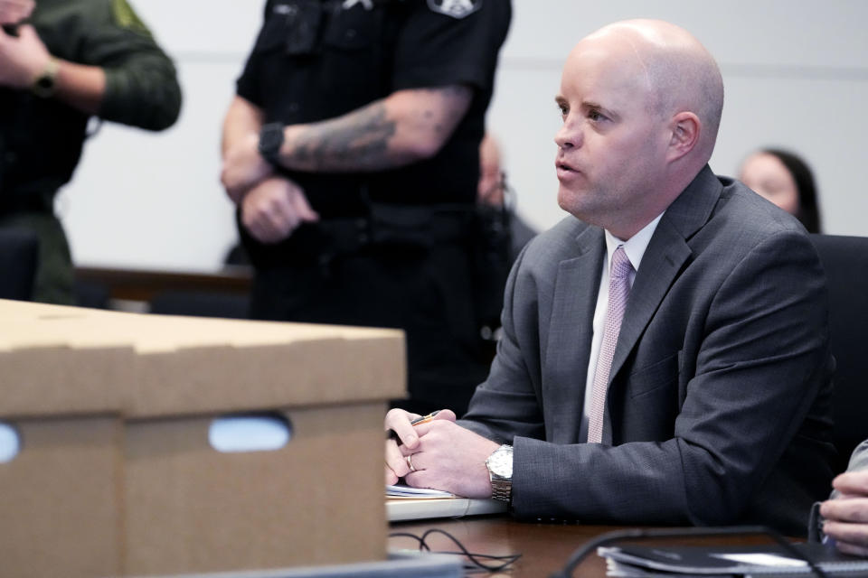 Lake County Assistant State's Attorney Ben Dillon, listens to Judge Victoria A. Rossetti during a case management conference at the Lake County Courthouse Friday, Jan. 5, 2024, in Waukegan, Ill. A case management conference is scheduled for a suspect in a mass shooting that left seven people dead during a July 4 parade in Highland Park, Illinois. (AP Photo/Nam Y. Huh, Pool)