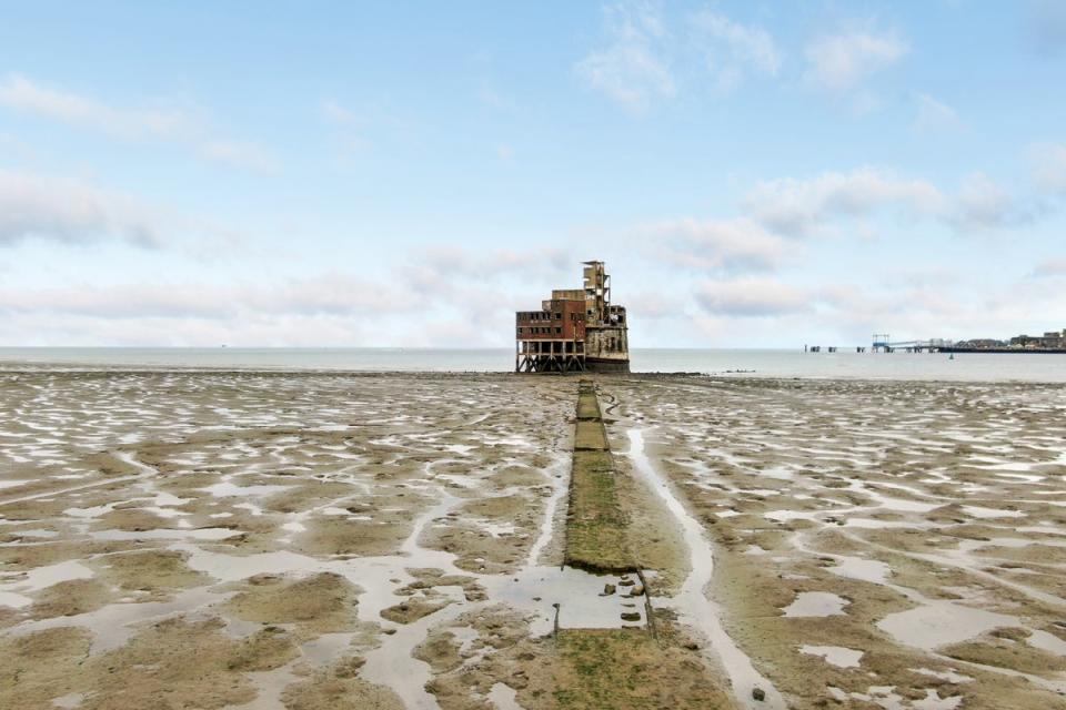 The tower is accessible by a causeway at low tide (Savills)