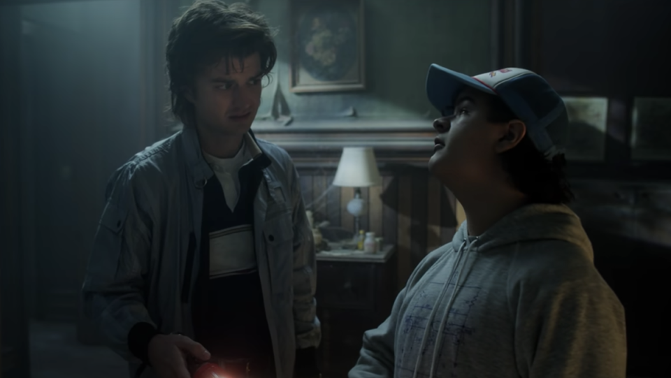 Steve and Dustin explore a haunted house in Stranger Things 4