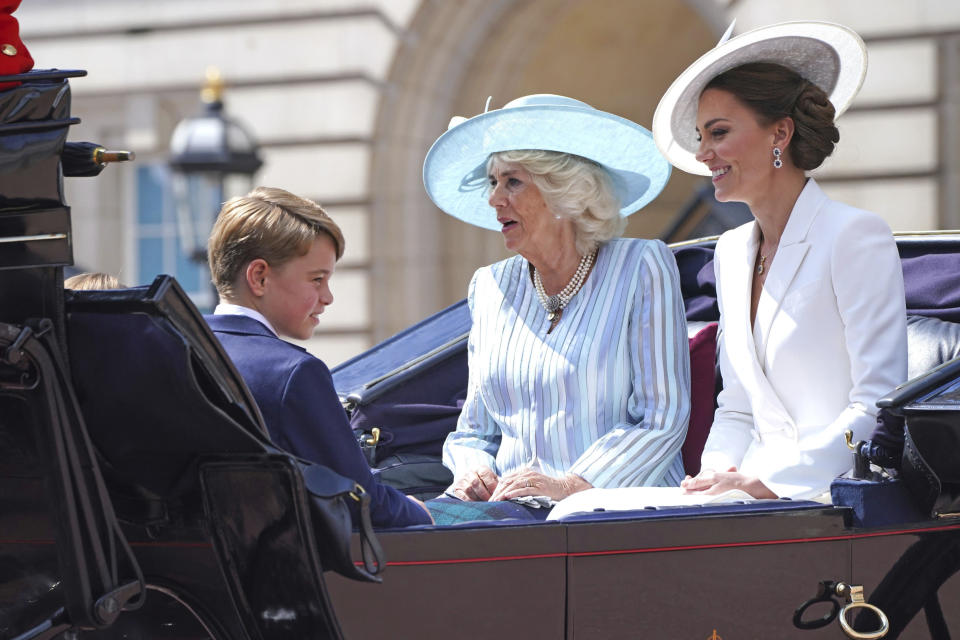 Prince George, Camilla, Duchess of Cornwall, and Kate, Duchess of Cambridge during Trooping the Colour on Thursday. - Credit: AP