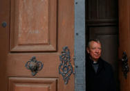 Miklos Beer, the bishop of Vac, stands at the gates of the cathedral in Vac, Hungary March 9, 2017. REUTERS/Laszlo Balogh