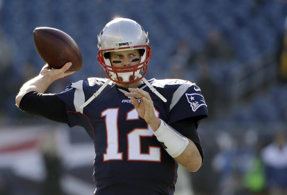 FILE - IN this Sunday, Dec. 4, 2016 file photo, New England Patriots quarterback Tom Brady warms up before an NFL football game against the Los Angeles Rams in Foxborough, Mass. As usual, the Patriots are pushing for the AFC's best record. With a win they would become the first team in NFL history with eight consecutive division titles. The Patriots play the Denver Broncos on Sunday, Dec. 18, 2016. (AP Photo/Elise Amendola, File)