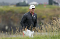 Brooks Koepka walks to the 17th green during the second round of the U.S. Open Championship golf tournament Friday, June 14, 2019, in Pebble Beach, Calif. (AP Photo/Matt York)