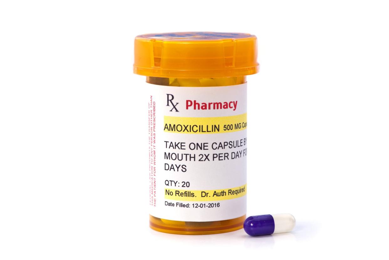 Amoxicillin prescription bottle. Amoxicillin is a generic medication name and label was created by photographer.
