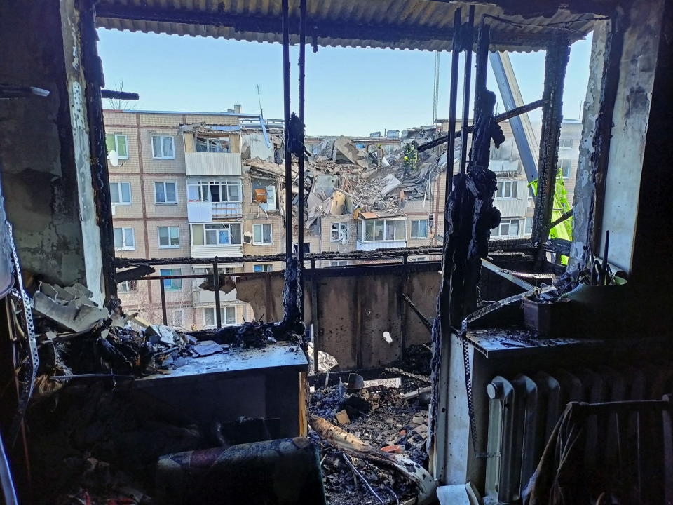 An interior view of an apartment damaged by an airstrike.